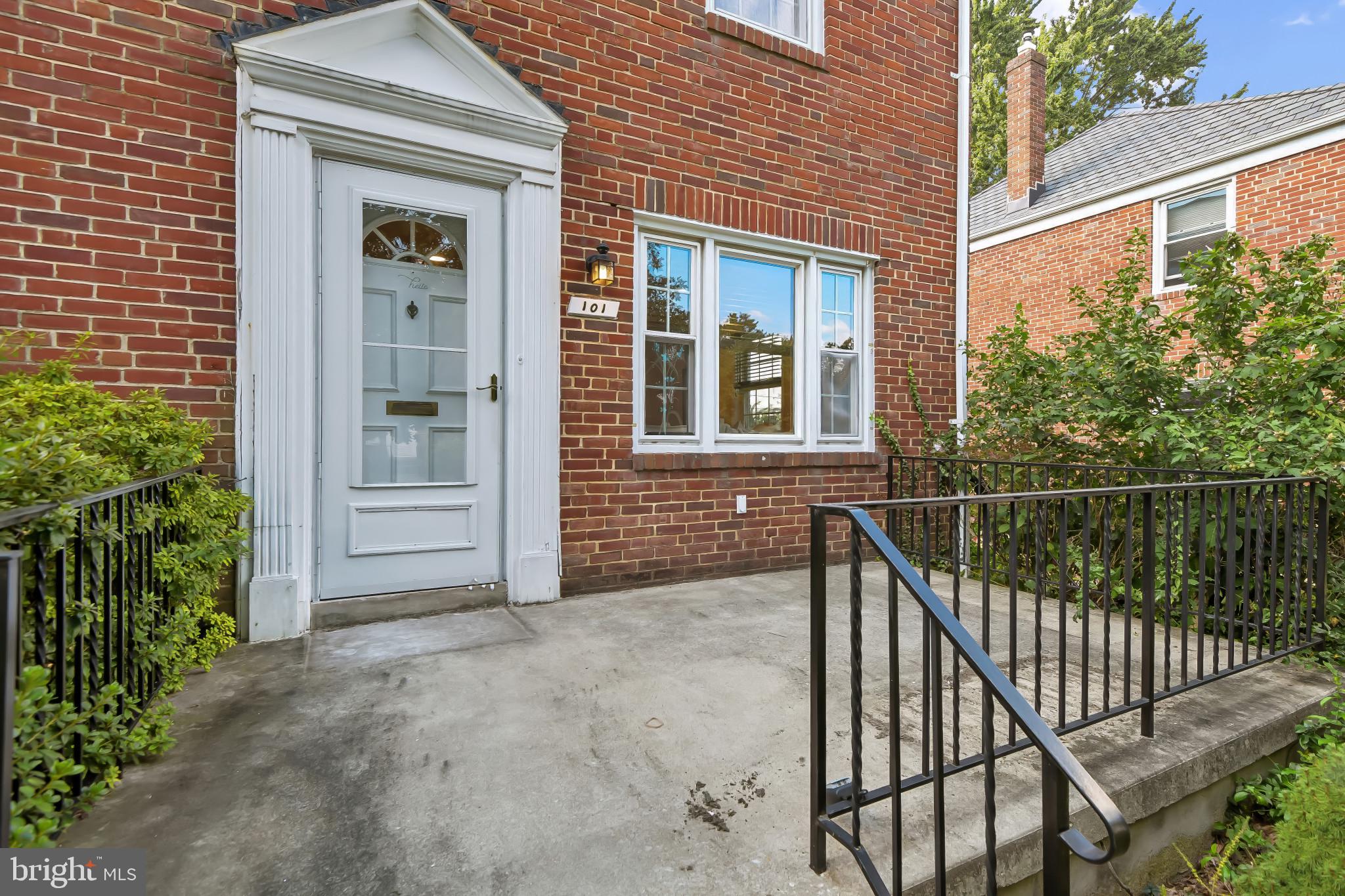 101 Regester Avenue Baltimore, MD 21212 - Photo 3 of 53 a view of front door and potted plants