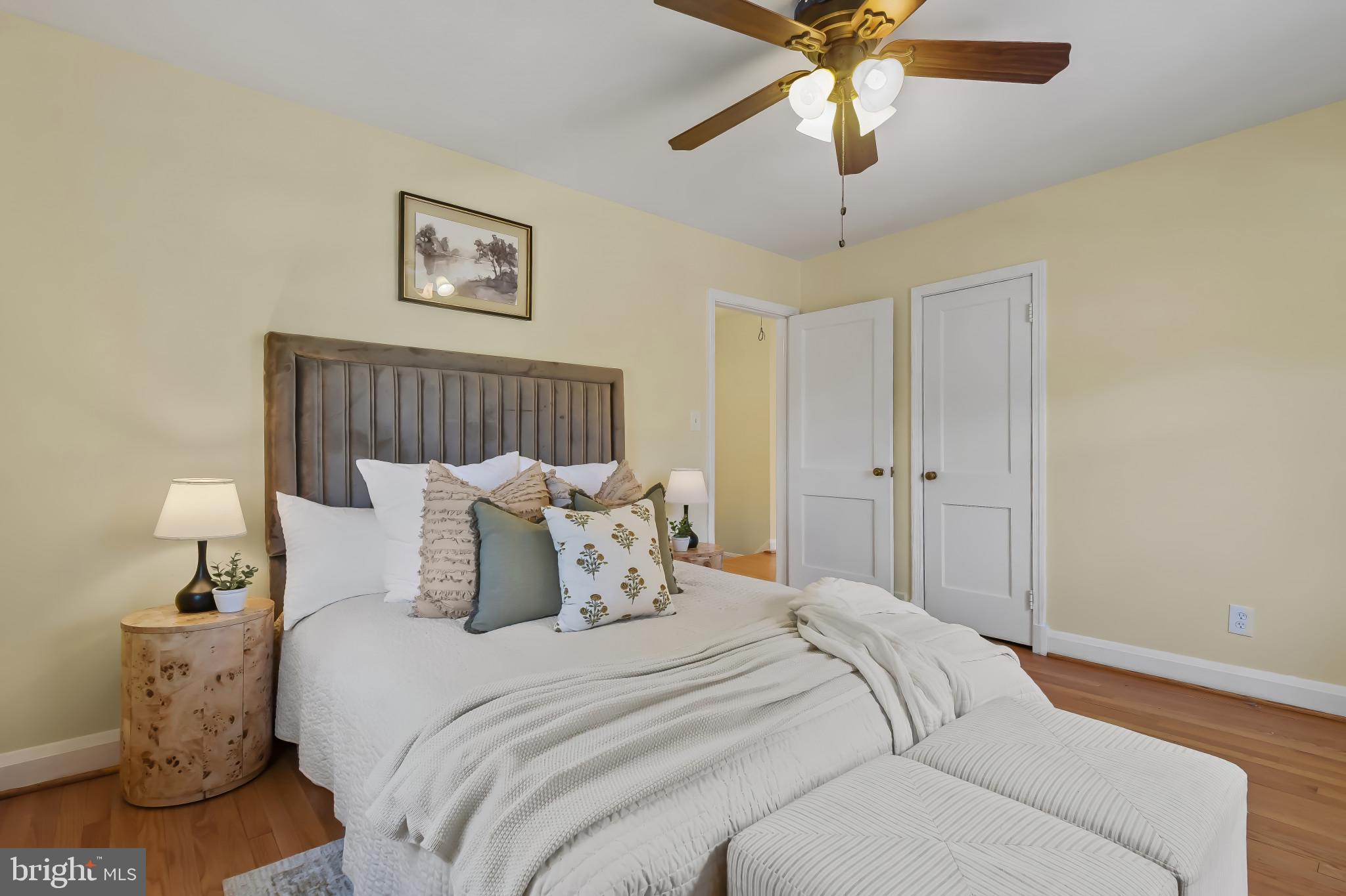 101 Regester Avenue Baltimore, MD 21212 - Photo 33 of 53 a bedroom with bed and a chandelier