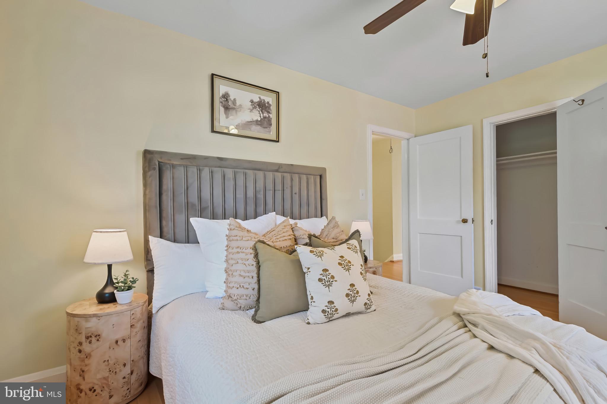 101 Regester Avenue Baltimore, MD 21212 - Photo 35 of 53 a bedroom with bed and wooden floor