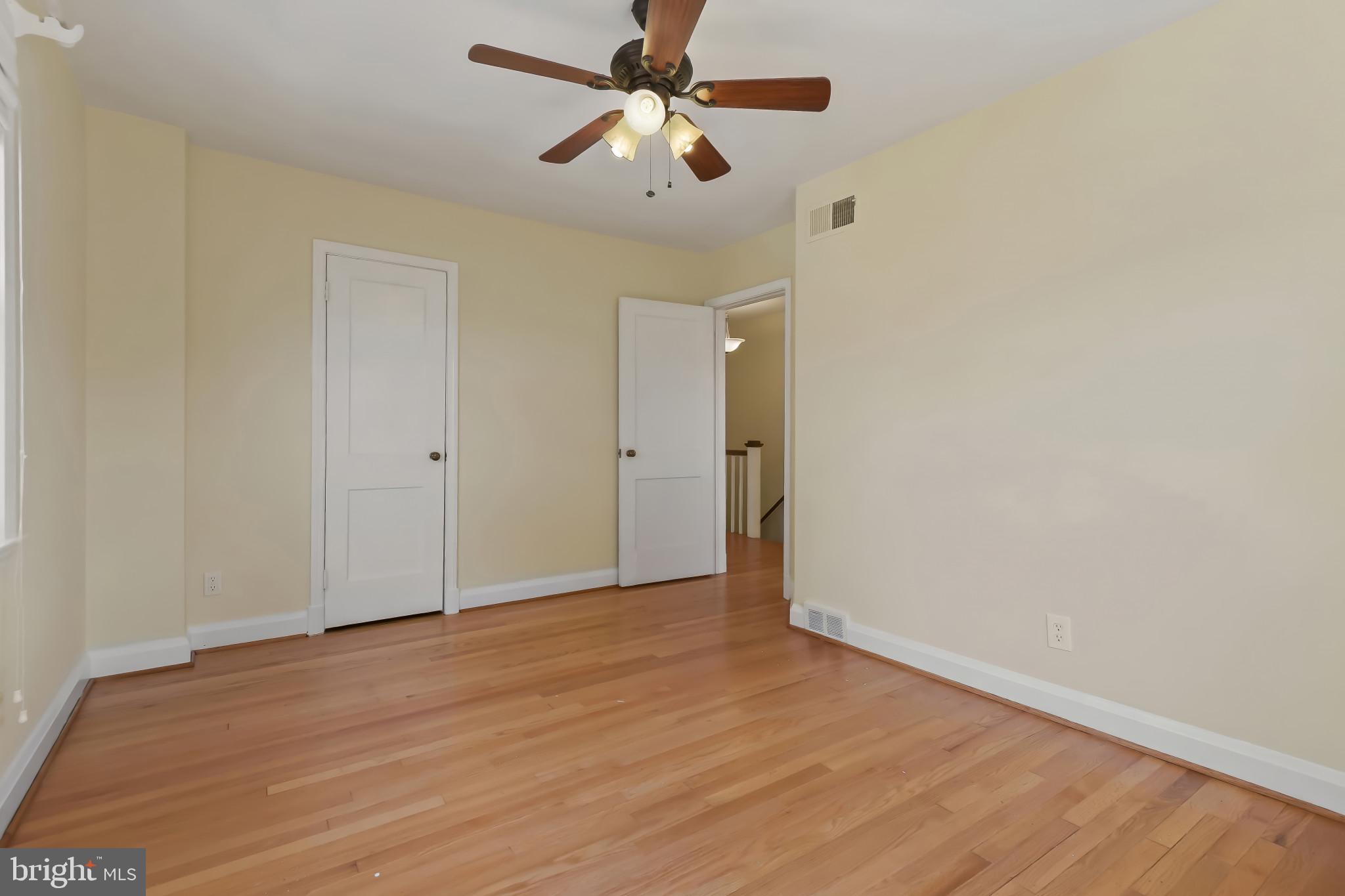 101 Regester Avenue Baltimore, MD 21212 - Photo 38 of 53 wooden floor in an empty room
