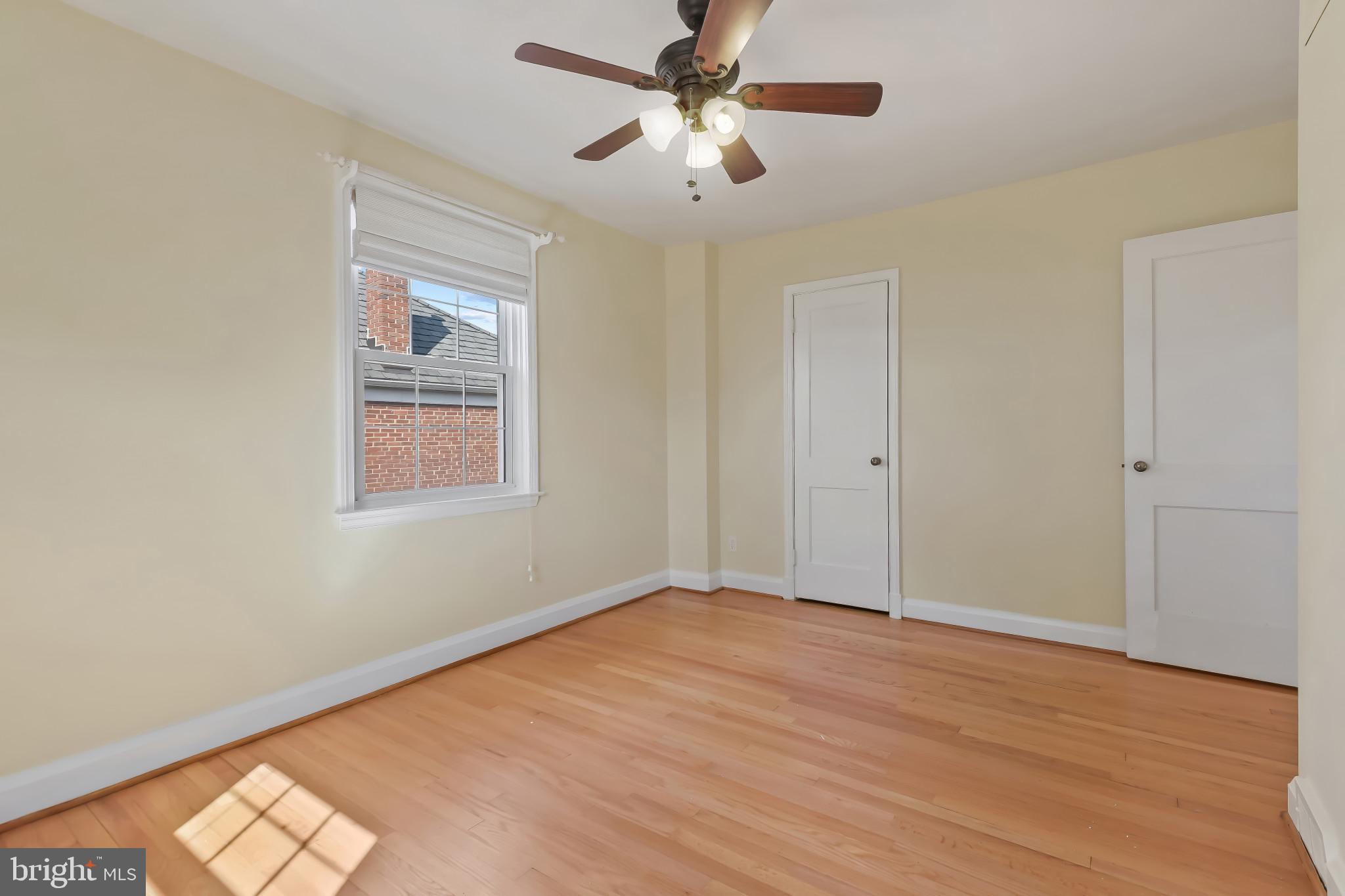 101 Regester Avenue Baltimore, MD 21212 - Photo 39 of 53 a view of an empty room with a window