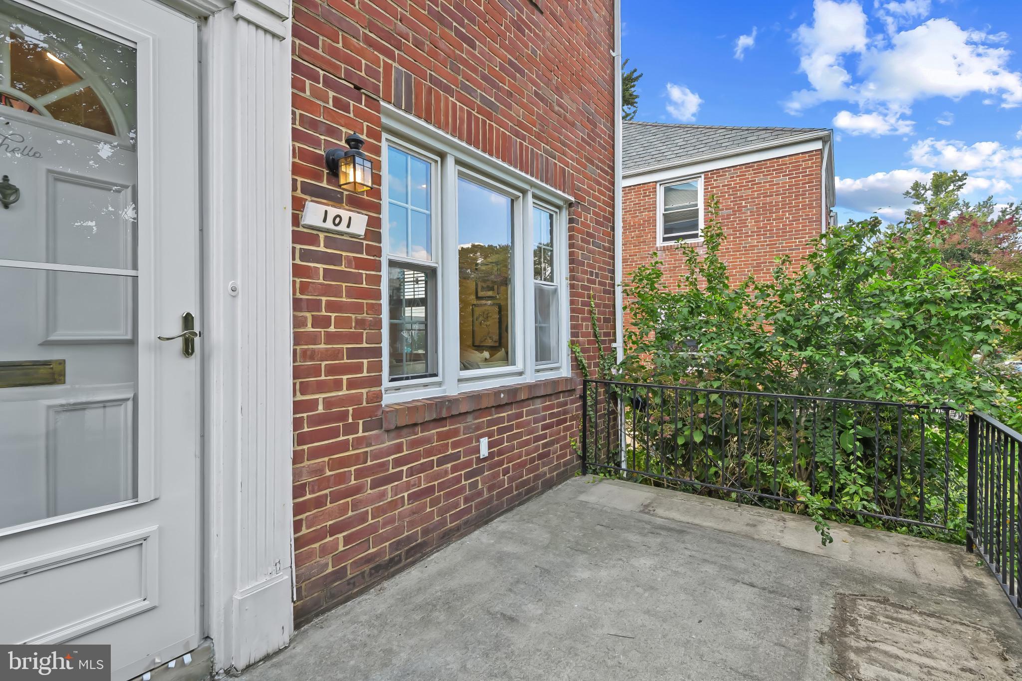 101 Regester Avenue Baltimore, MD 21212 - Photo 4 of 53 a view of entrance of house and yard
