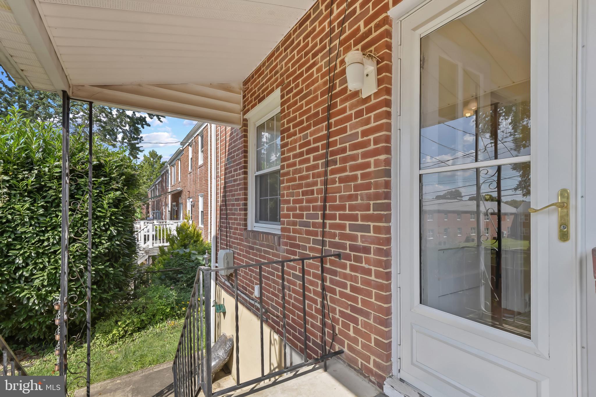 101 Regester Avenue Baltimore, MD 21212 - Photo 44 of 53 a view of balcony with wooden floor