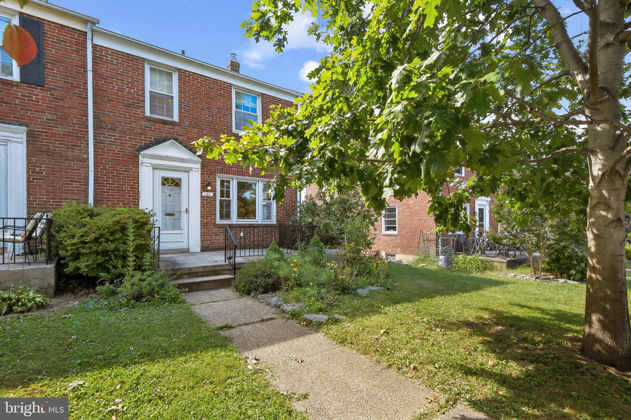 101 Regester Avenue Baltimore, MD 21212 - Photo 49 of 53 a front view of a house with a yard