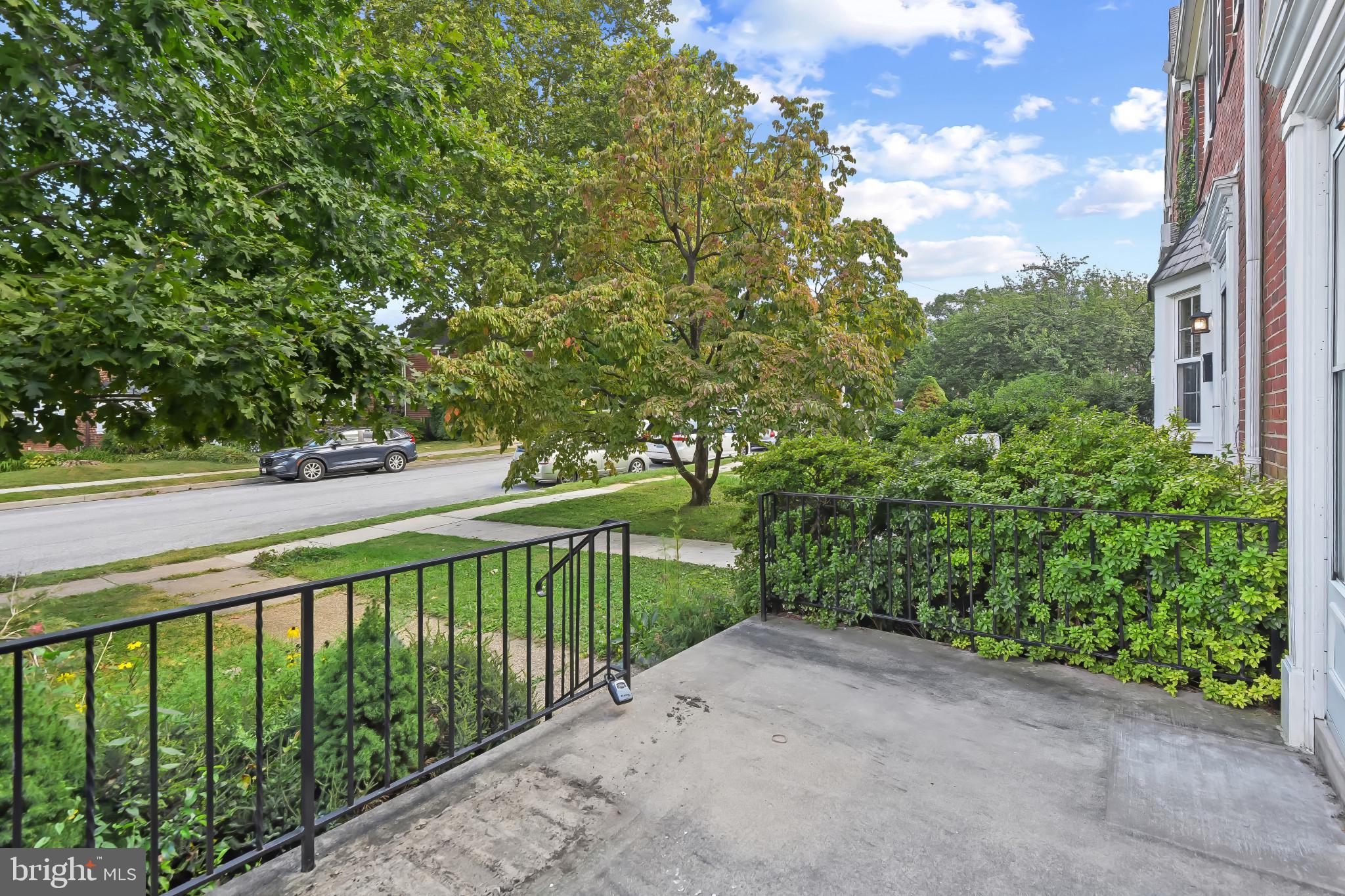 101 Regester Avenue Baltimore, MD 21212 - Photo 5 of 53 a view of a balcony with trees