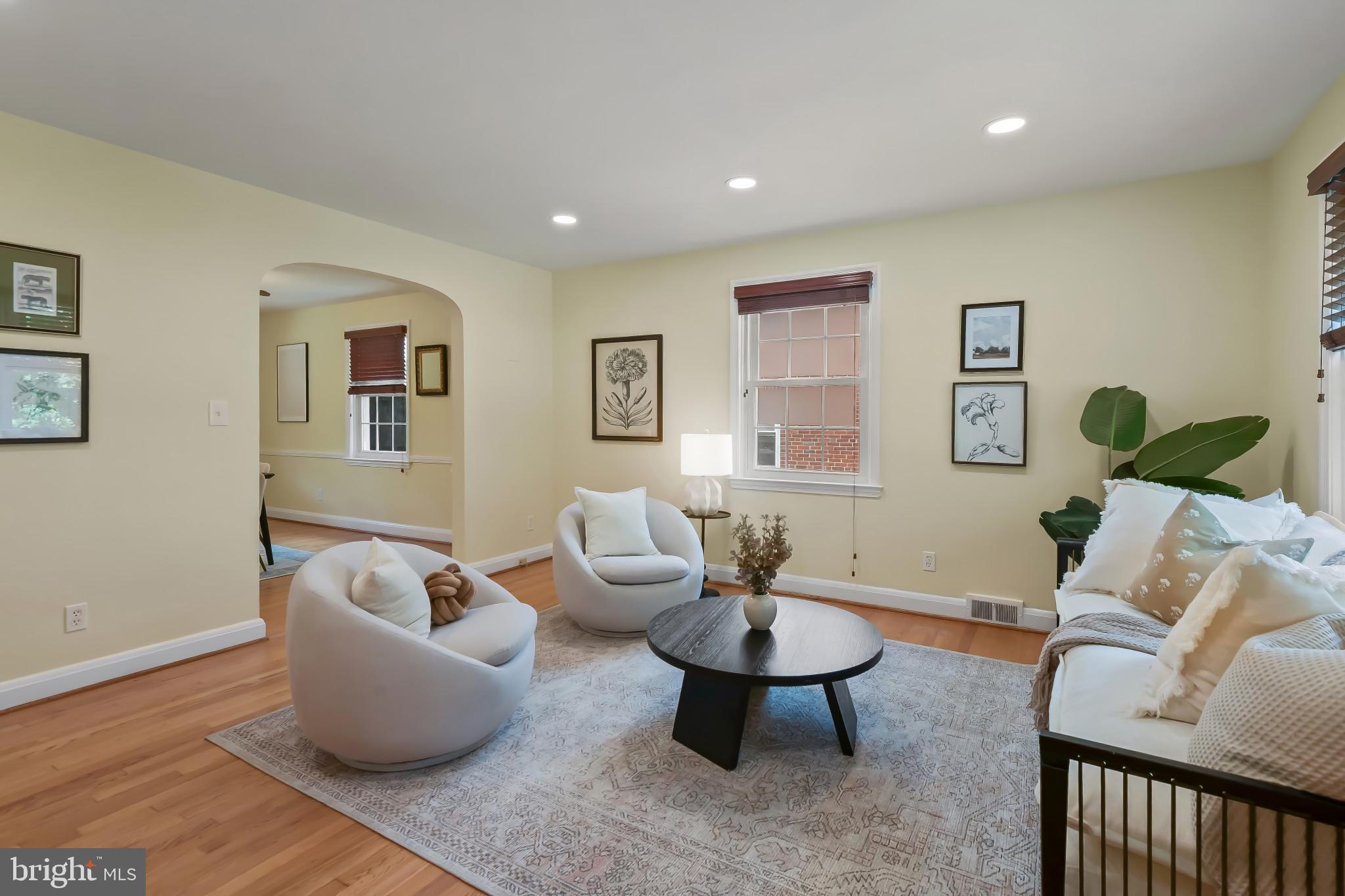 101 Regester Avenue Baltimore, MD 21212 - Photo 6 of 53 a living room with furniture and wooden floor