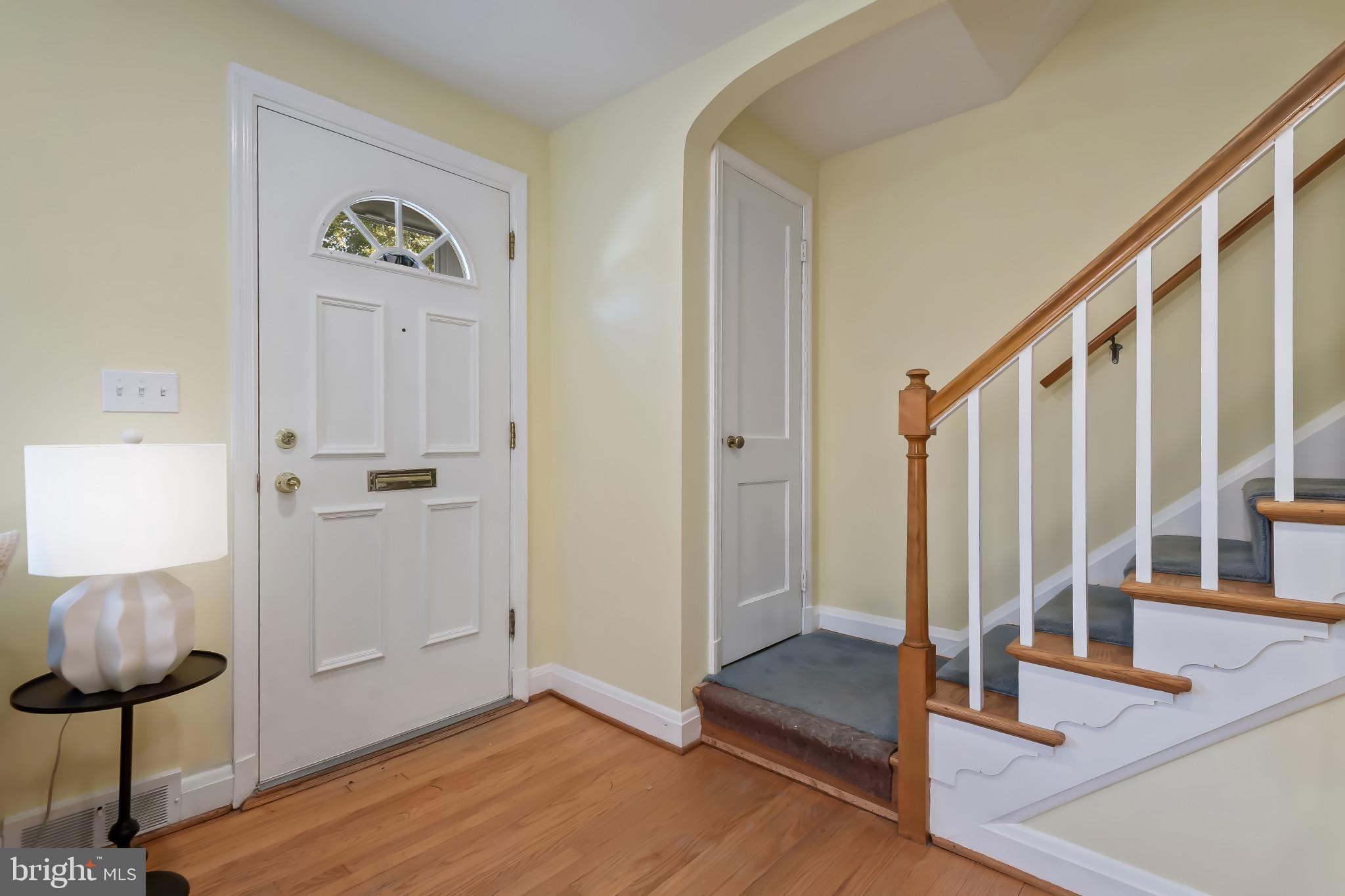 101 Regester Avenue Baltimore, MD 21212 - Photo 8 of 53 a view of entryway with wooden floor
