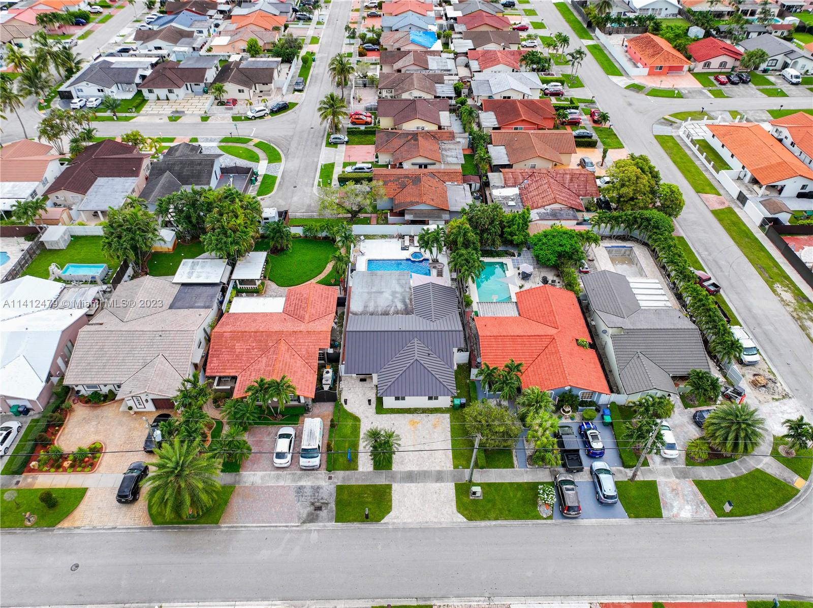 13821 Southwest 14th Street Miami, FL 33184 - Photo 56 of 58 an aerial view of a house with garden space and street view