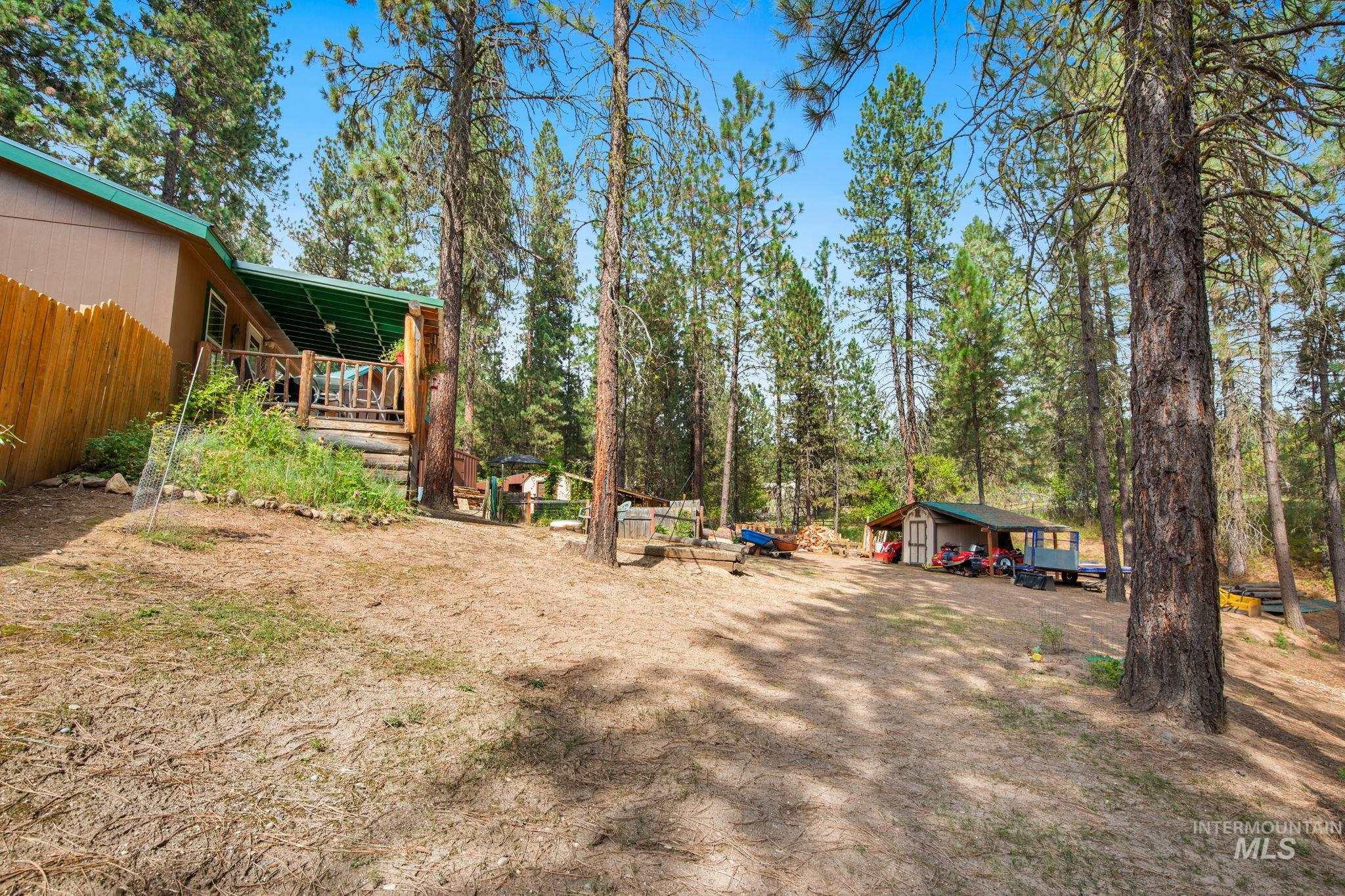 10 Cricket Road Garden Valley, ID 83622 - Photo 15 of 50 View of yard with a deck