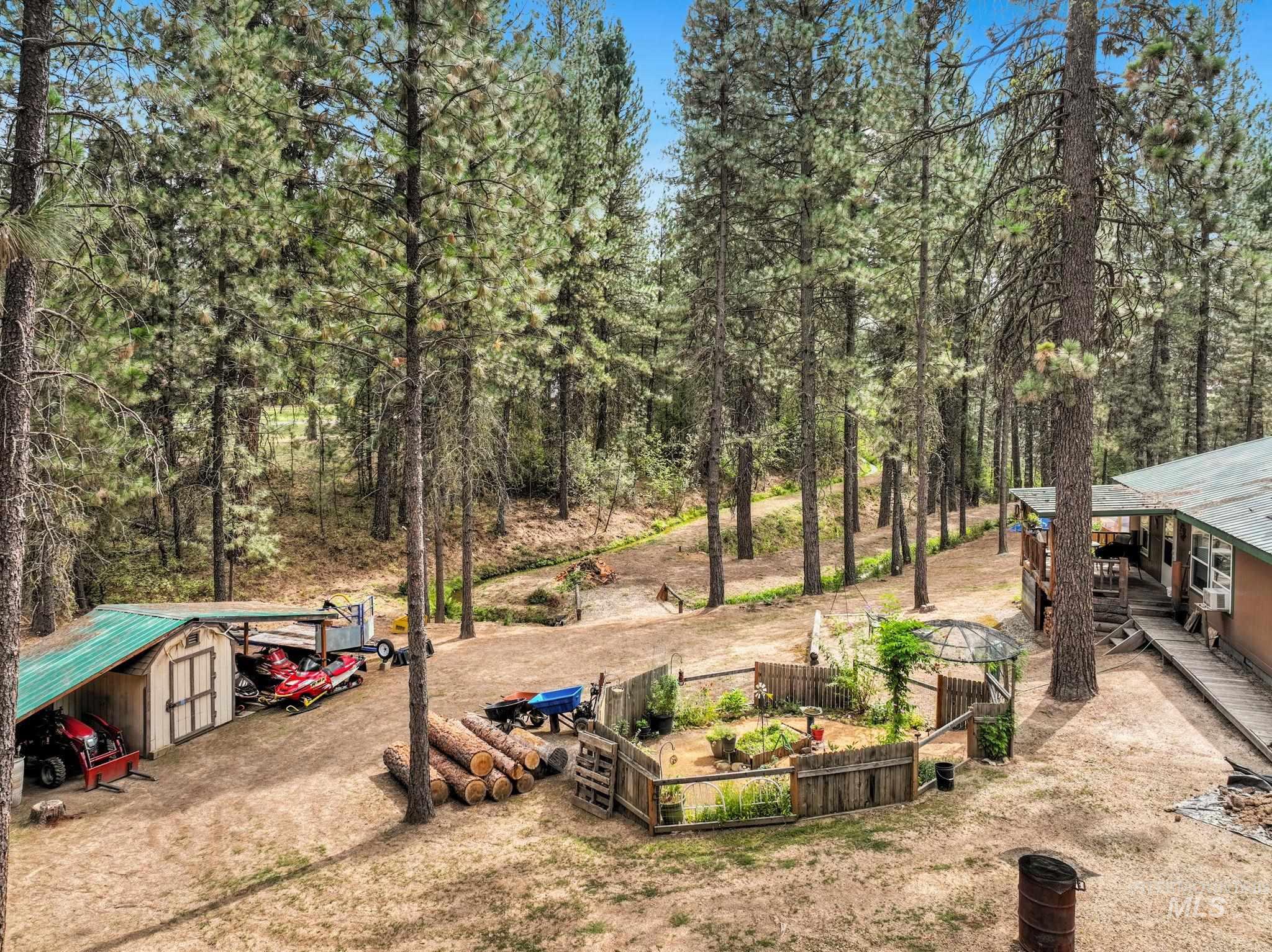10 Cricket Road Garden Valley, ID 83622 - Photo 25 of 50 View of yard featuring an outdoor structure