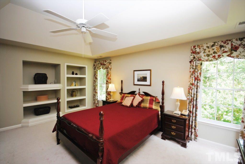 8805 Braceridge Road Raleigh, NC 27613 - Photo 20 of 25 a bedroom with a bed and a window