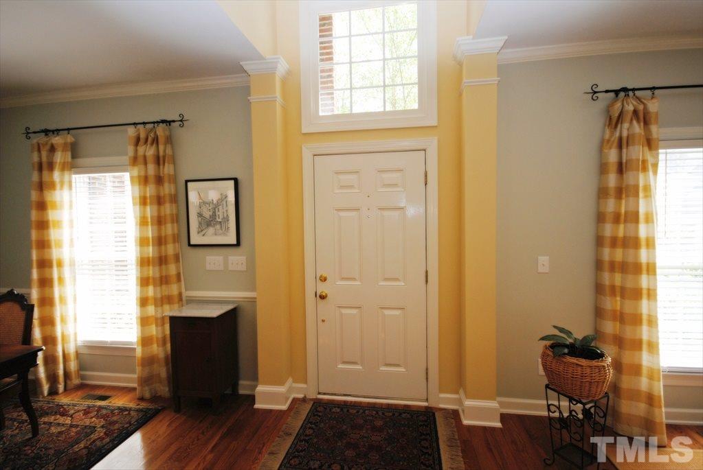 8805 Braceridge Road Raleigh, NC 27613 - Photo 3 of 25 a view of a bathroom with a window and wooden floor