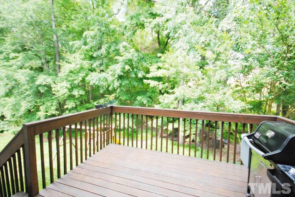 8805 Braceridge Road Raleigh, NC 27613 - Photo 22 of 25 a balcony with wooden floor in outdoor space