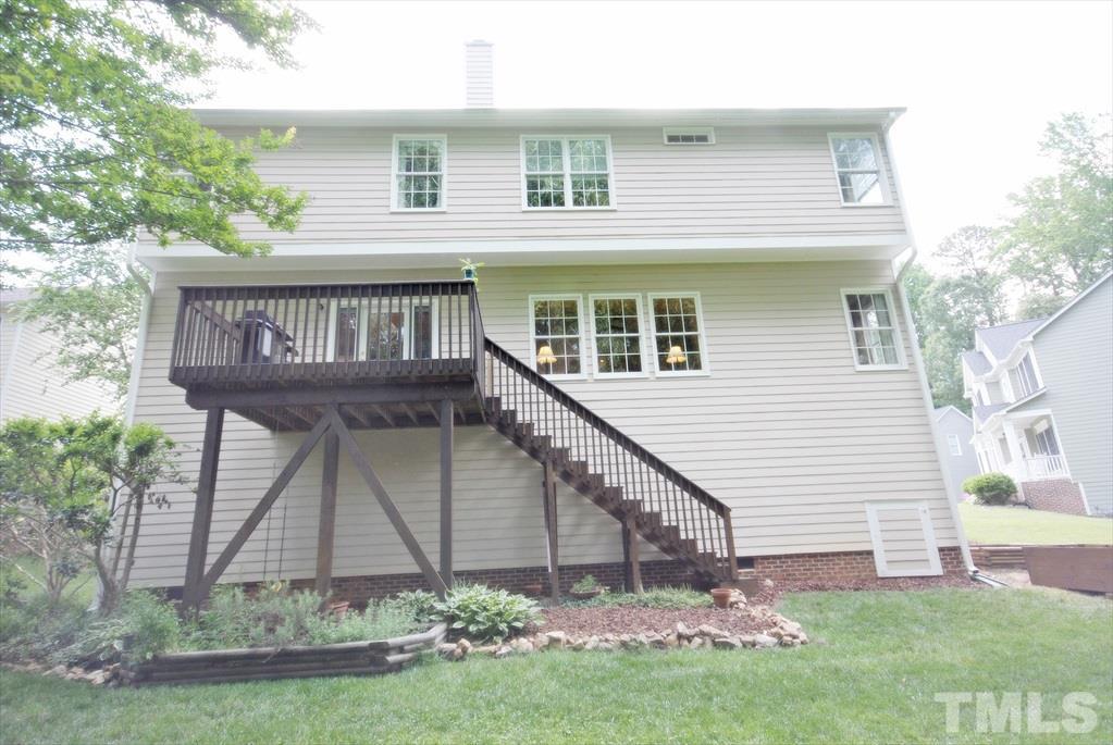 8805 Braceridge Road Raleigh, NC 27613 - Photo 24 of 25 a house view with a garden space