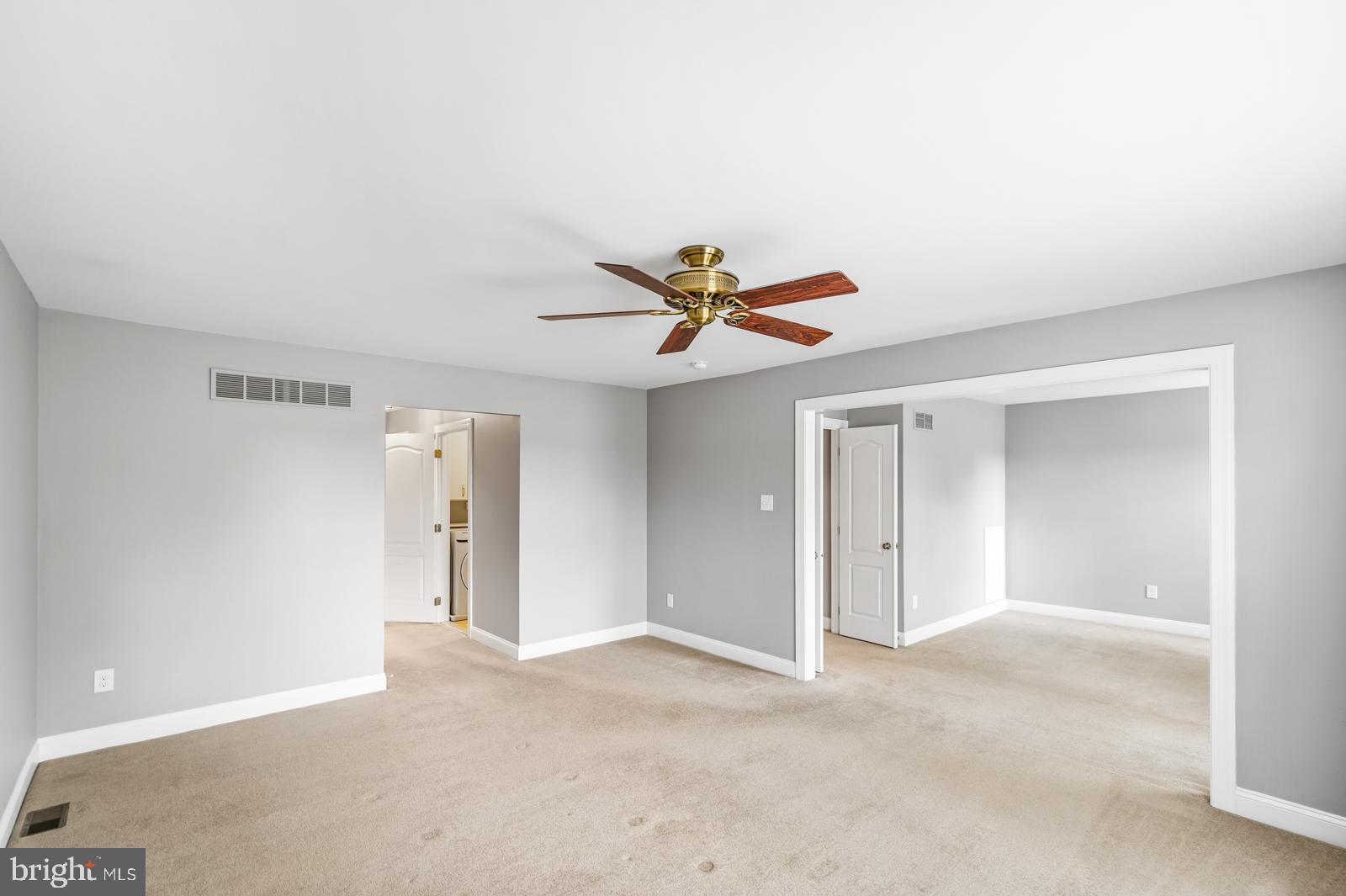 145 Ridgeview Circle Berwyn, PA 19312 - Photo 23 of 38 Primary bedroom open to a serene sitting room