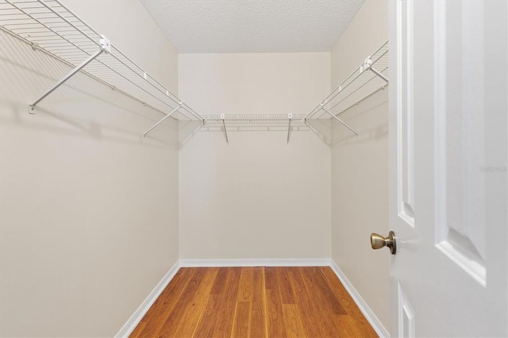 10767 Southeast 174th Loop Summerfield, FL 34491 - Photo 22 of 45 a view of a room with wooden floor