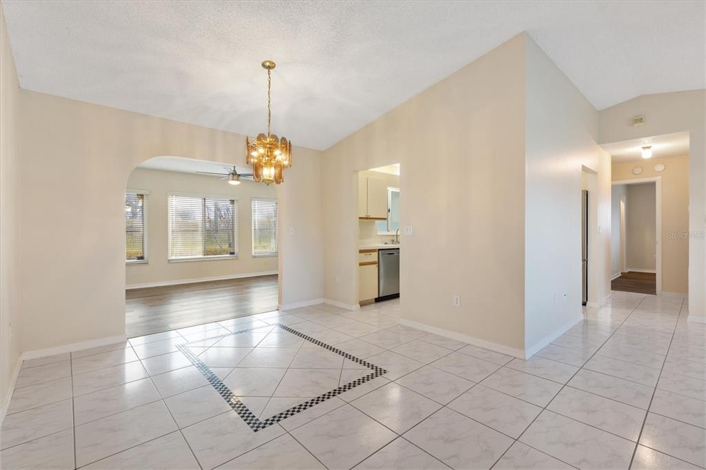 10767 Southeast 174th Loop Summerfield, FL 34491 - Photo 9 of 45 a view interior of a house an entryway and fire place