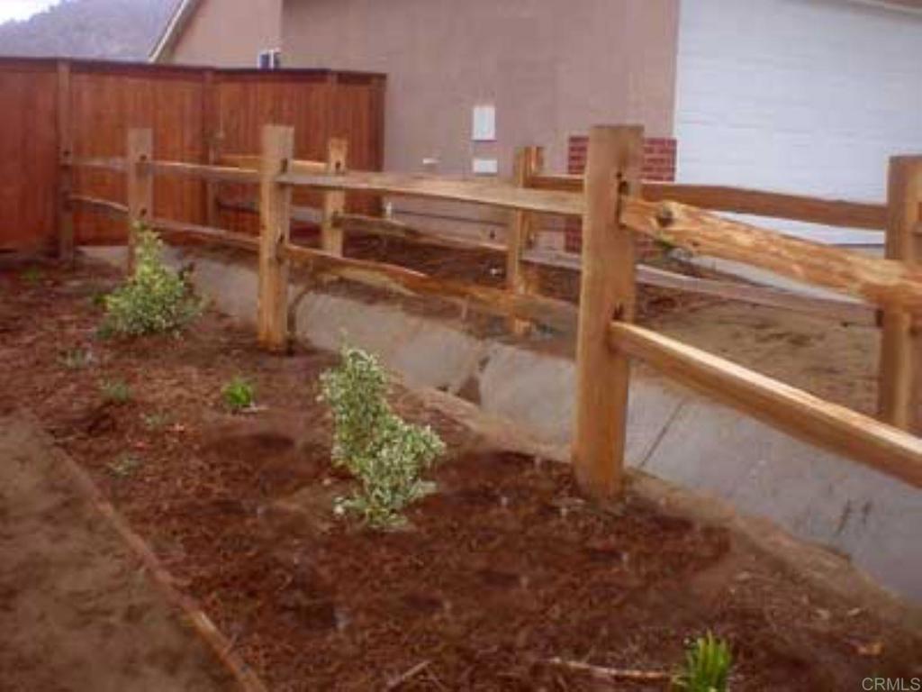 10166 Trocha De Penni Lakeside, CA 92040 - Photo 3 of 33 This is my favorite front yard fence for a minimum investment for usage and curb appeal. RENDERING