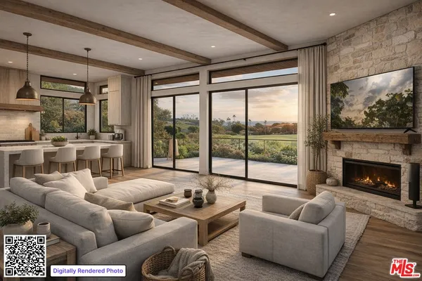 a living room with furniture large window and fireplace