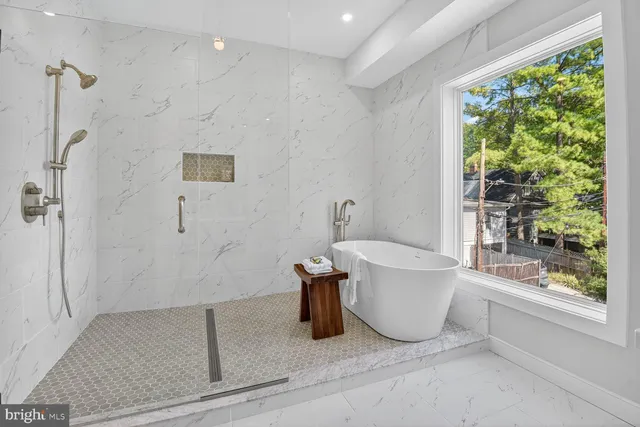 a bathroom with a shower and a bathtub