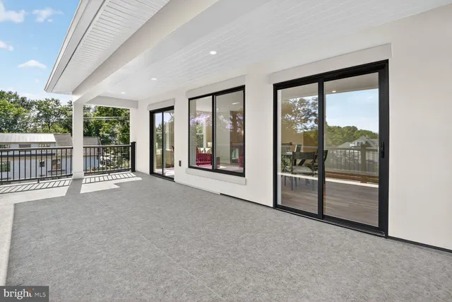a kitchen with cabinets and stainless steel appliances