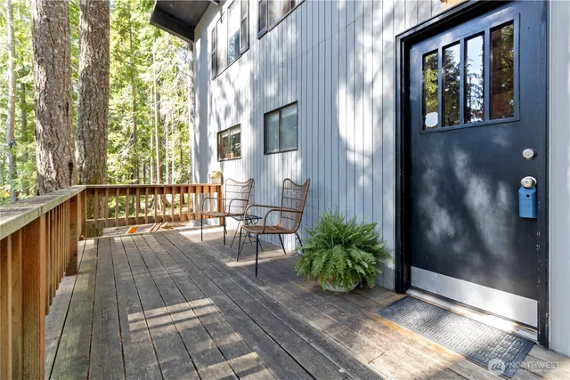 a view of balcony with furniture
