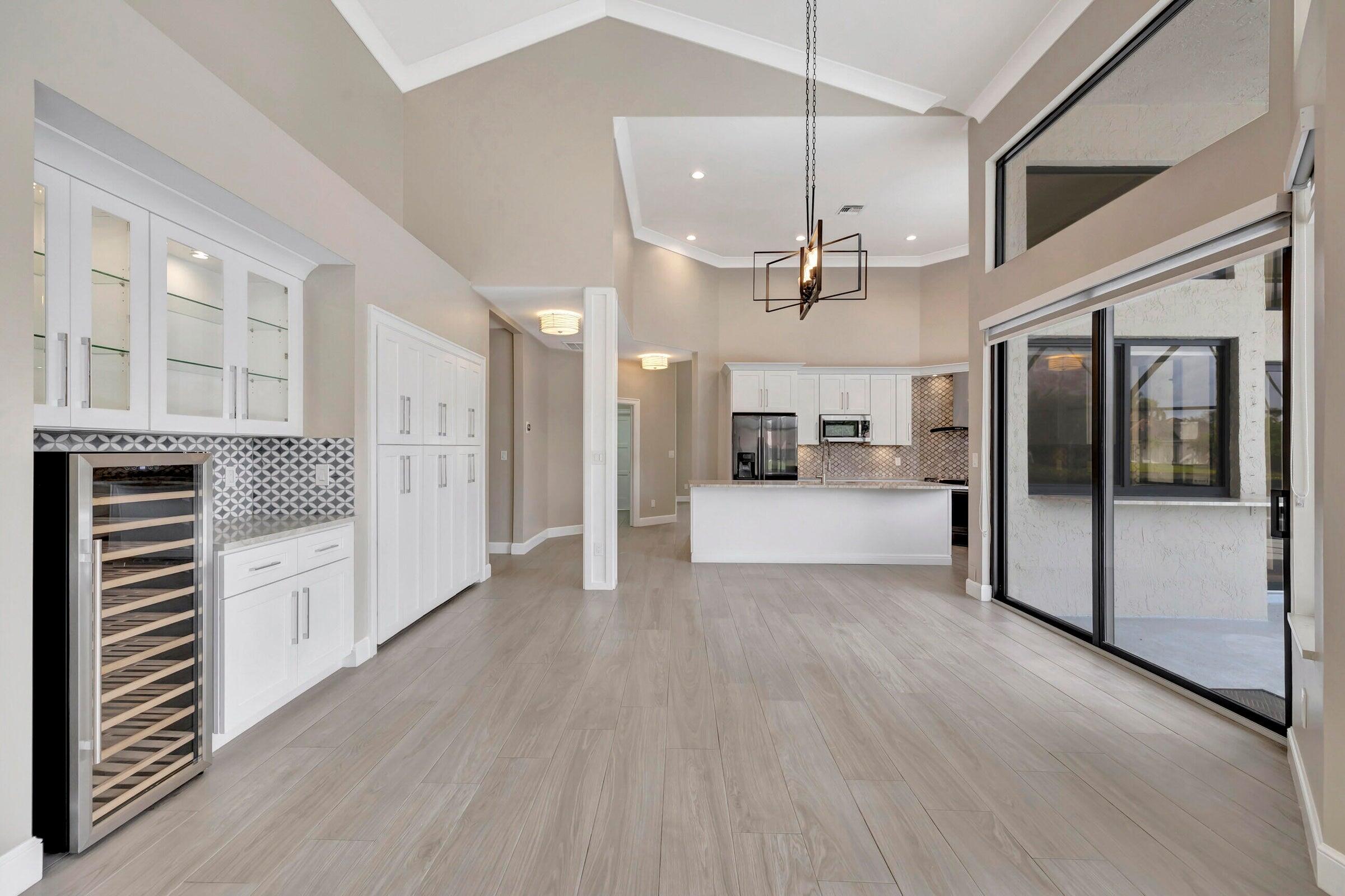 4875 Hunters Way Boca Raton, FL 33434 - Photo 20 of 43 Family Room off Open Kitchen!