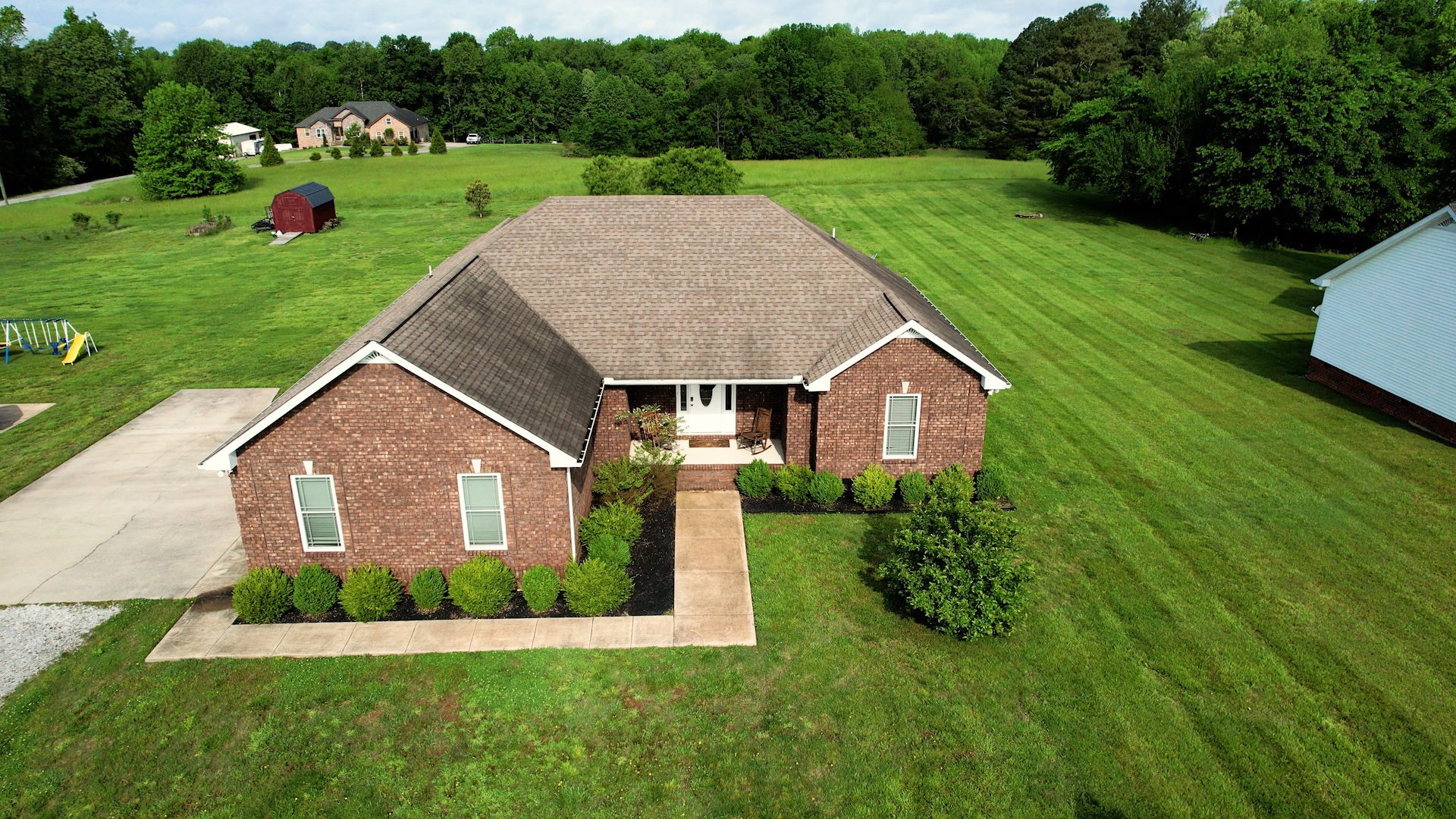 2870 Canoe Branch Road Lebanon, TN 37087 - Photo 1 of 45 a aerial view of a house next to a big yard and large trees