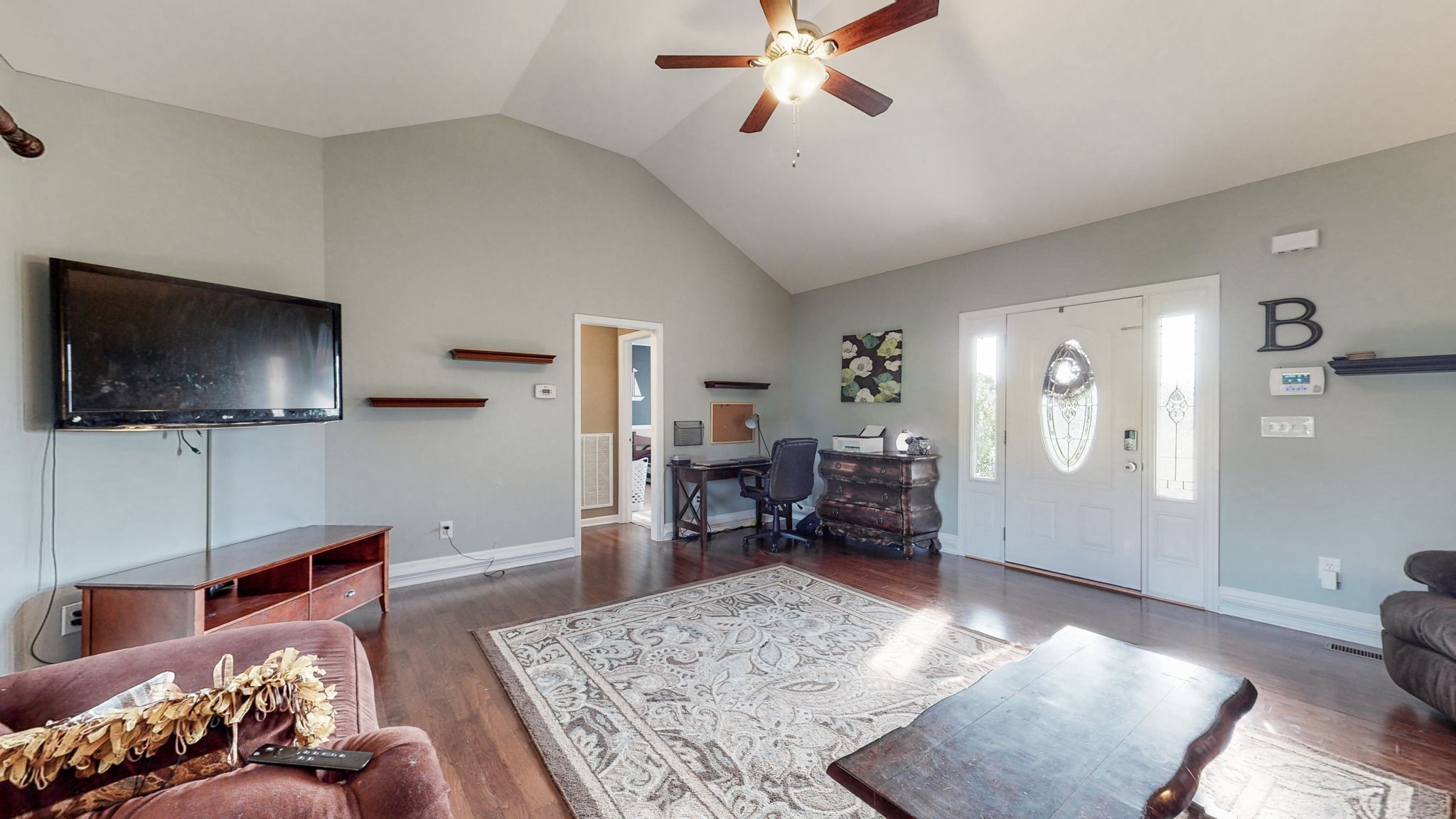 2870 Canoe Branch Road Lebanon, TN 37087 - Photo 13 of 45 a living room with furniture and a flat screen tv