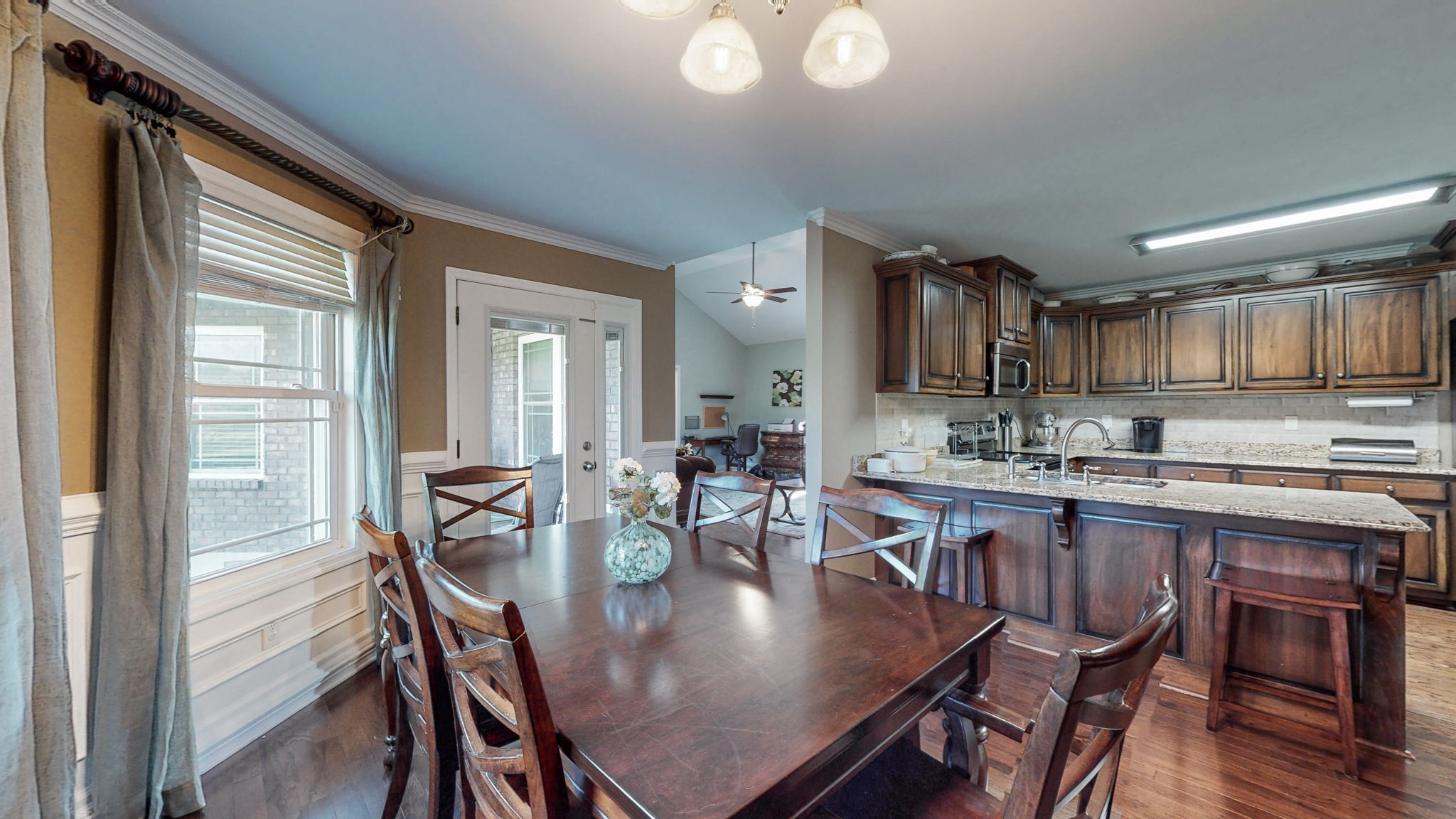 2870 Canoe Branch Road Lebanon, TN 37087 - Photo 16 of 45 a view of a dining room with furniture and wooden floor