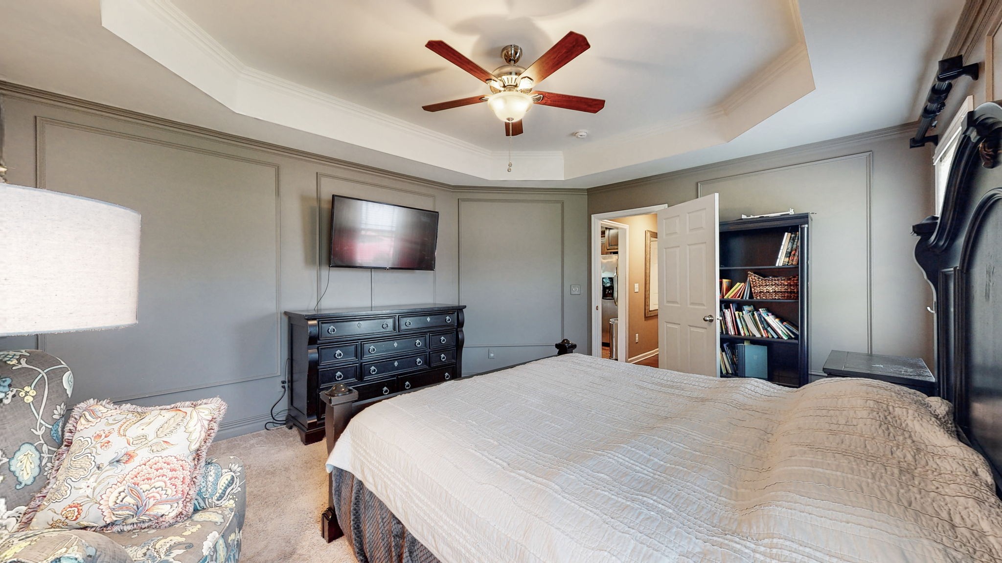 2870 Canoe Branch Road Lebanon, TN 37087 - Photo 23 of 45 a bedroom with a large bed and a chandelier