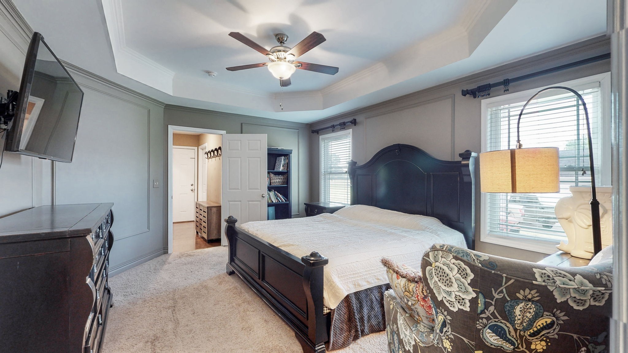 2870 Canoe Branch Road Lebanon, TN 37087 - Photo 24 of 45 a bedroom with a large bed and a chandelier