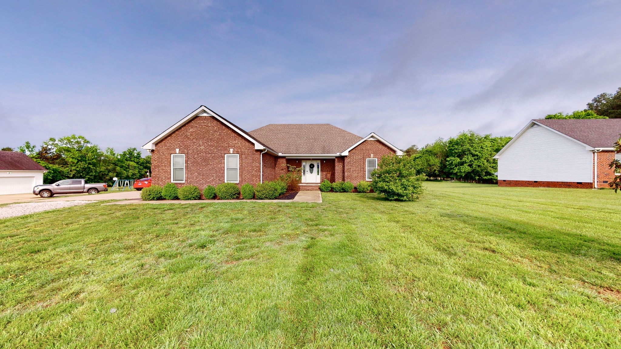 2870 Canoe Branch Road Lebanon, TN 37087 - Photo 3 of 45 a front view of a house with yard and green space