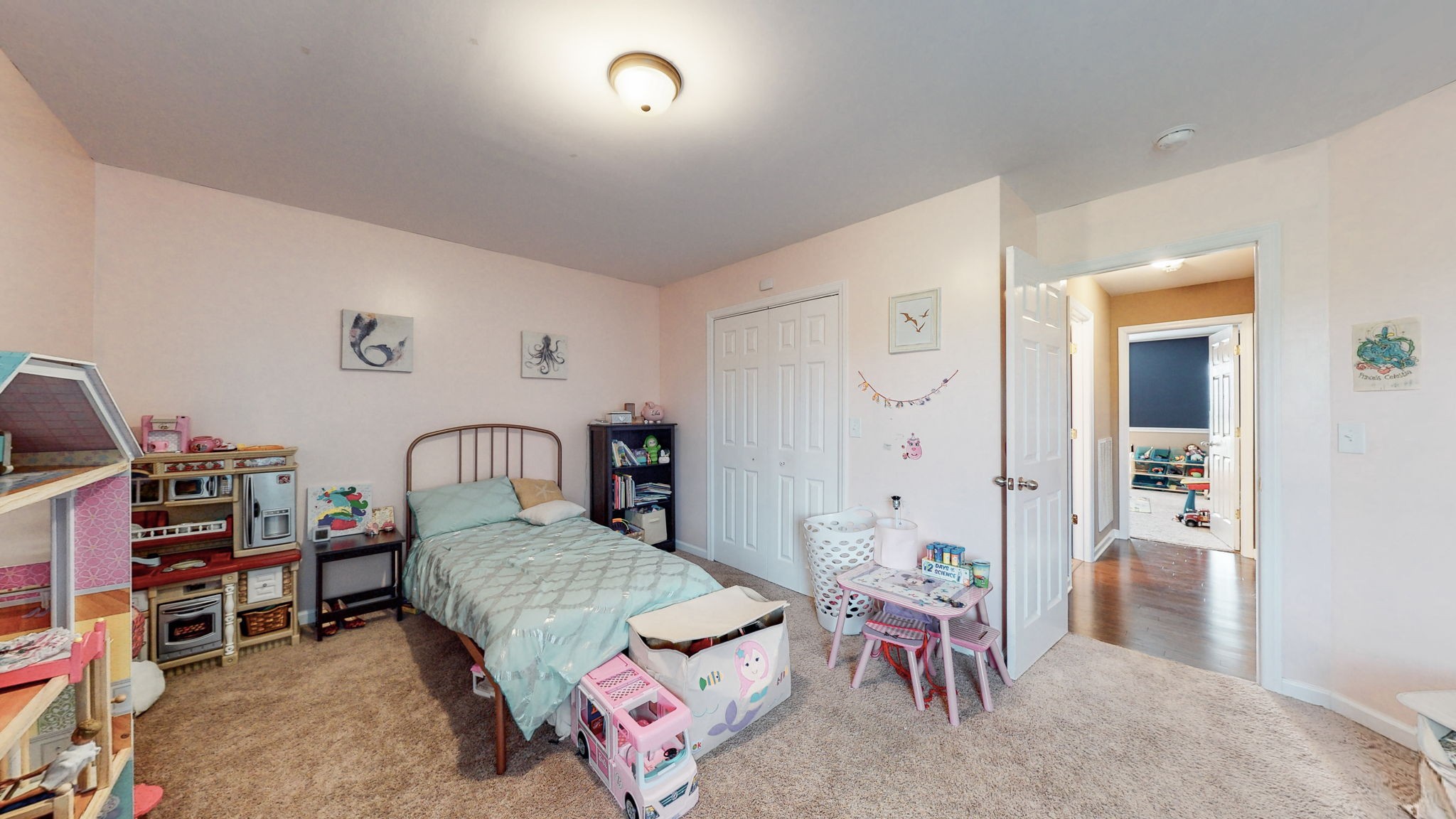 2870 Canoe Branch Road Lebanon, TN 37087 - Photo 32 of 45 a bedroom with furniture and a chandelier