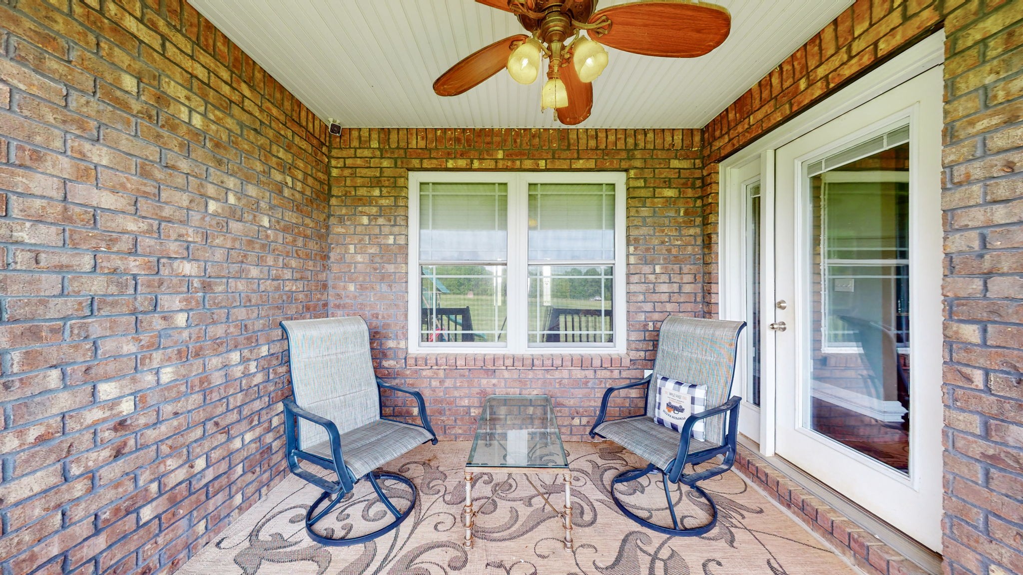 2870 Canoe Branch Road Lebanon, TN 37087 - Photo 36 of 45 a view of a patio with couple of chairs and a grill