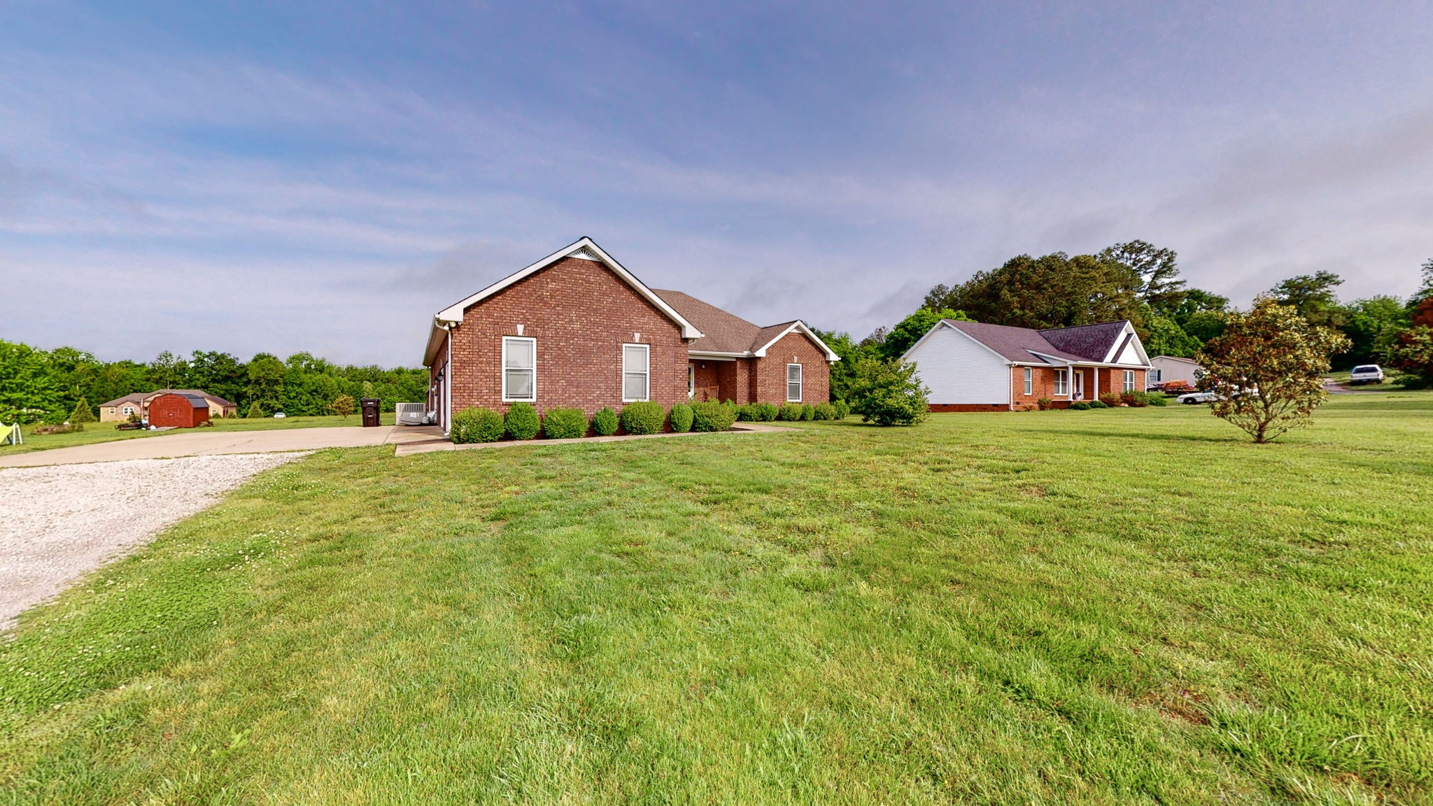 2870 Canoe Branch Road Lebanon, TN 37087 - Photo 5 of 45 a front view of a house with a yard and garage
