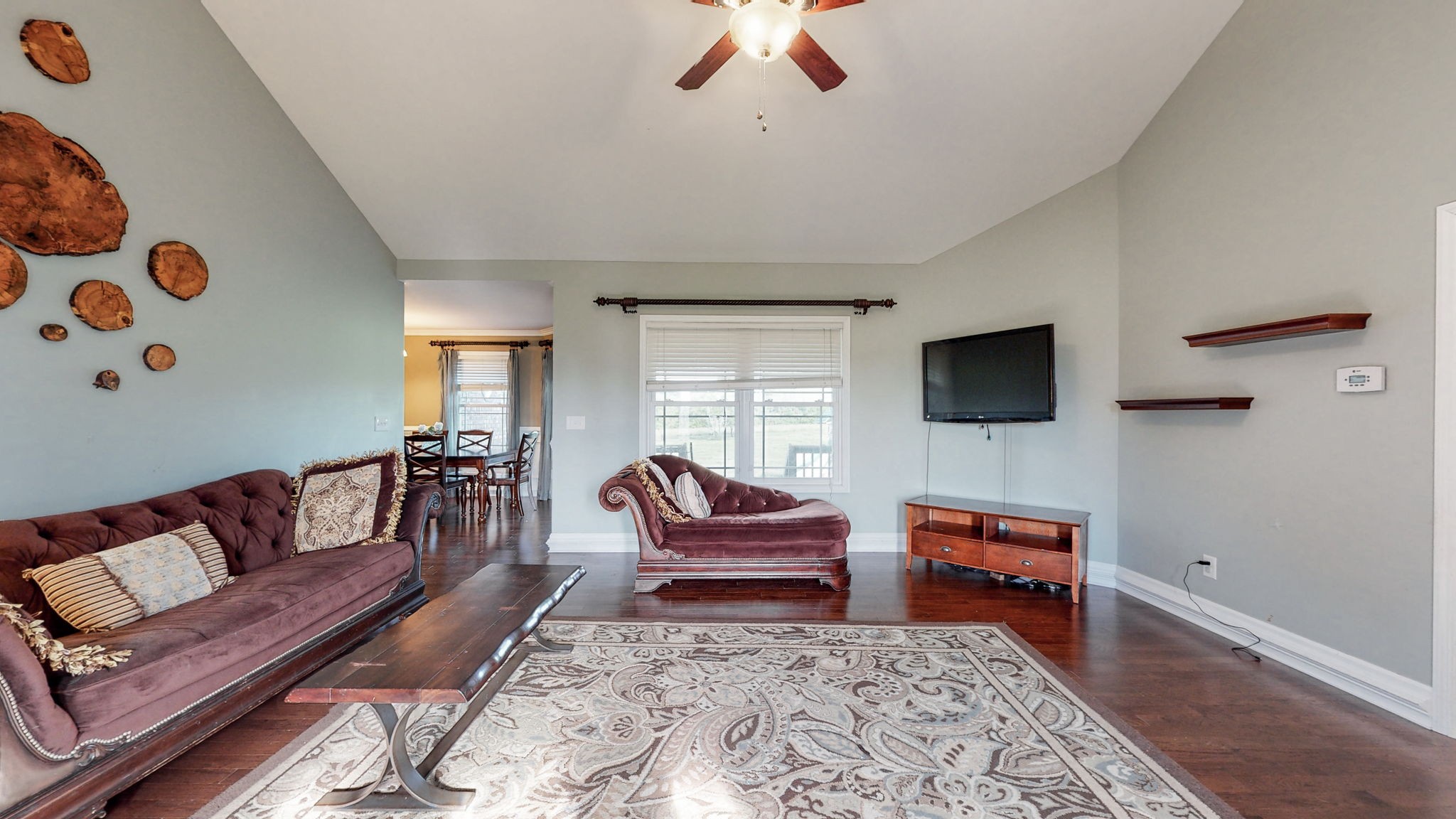 2870 Canoe Branch Road Lebanon, TN 37087 - Photo 8 of 45 a living room with furniture and a flat screen tv