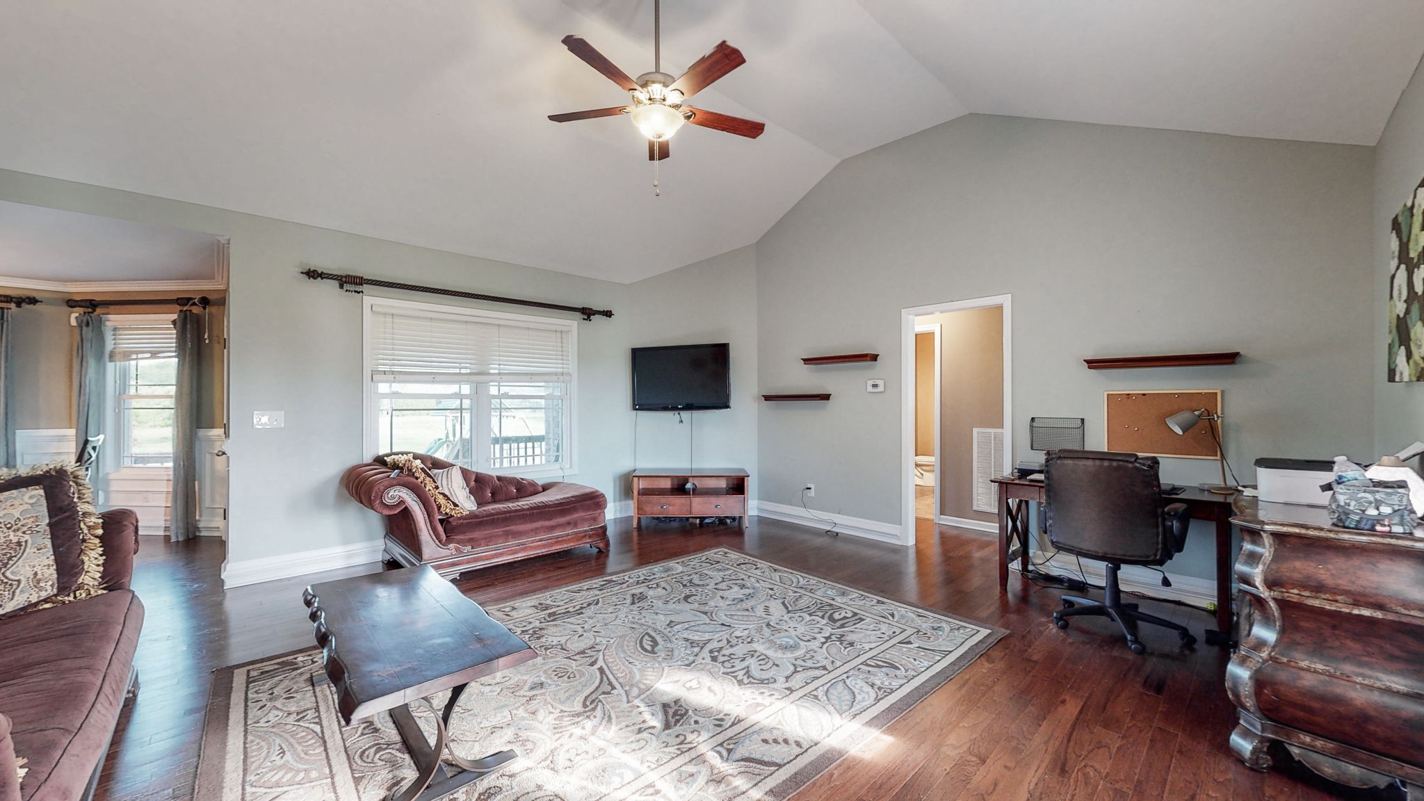 2870 Canoe Branch Road Lebanon, TN 37087 - Photo 10 of 45 a living room with furniture and a flat screen tv