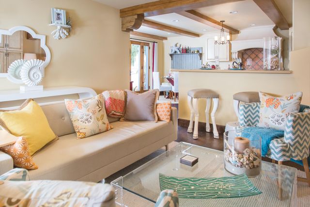 a living room with furniture and a rug