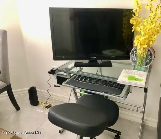 a kitchen with stainless steel appliances granite countertop a sink dishwasher and cabinets with wooden floor