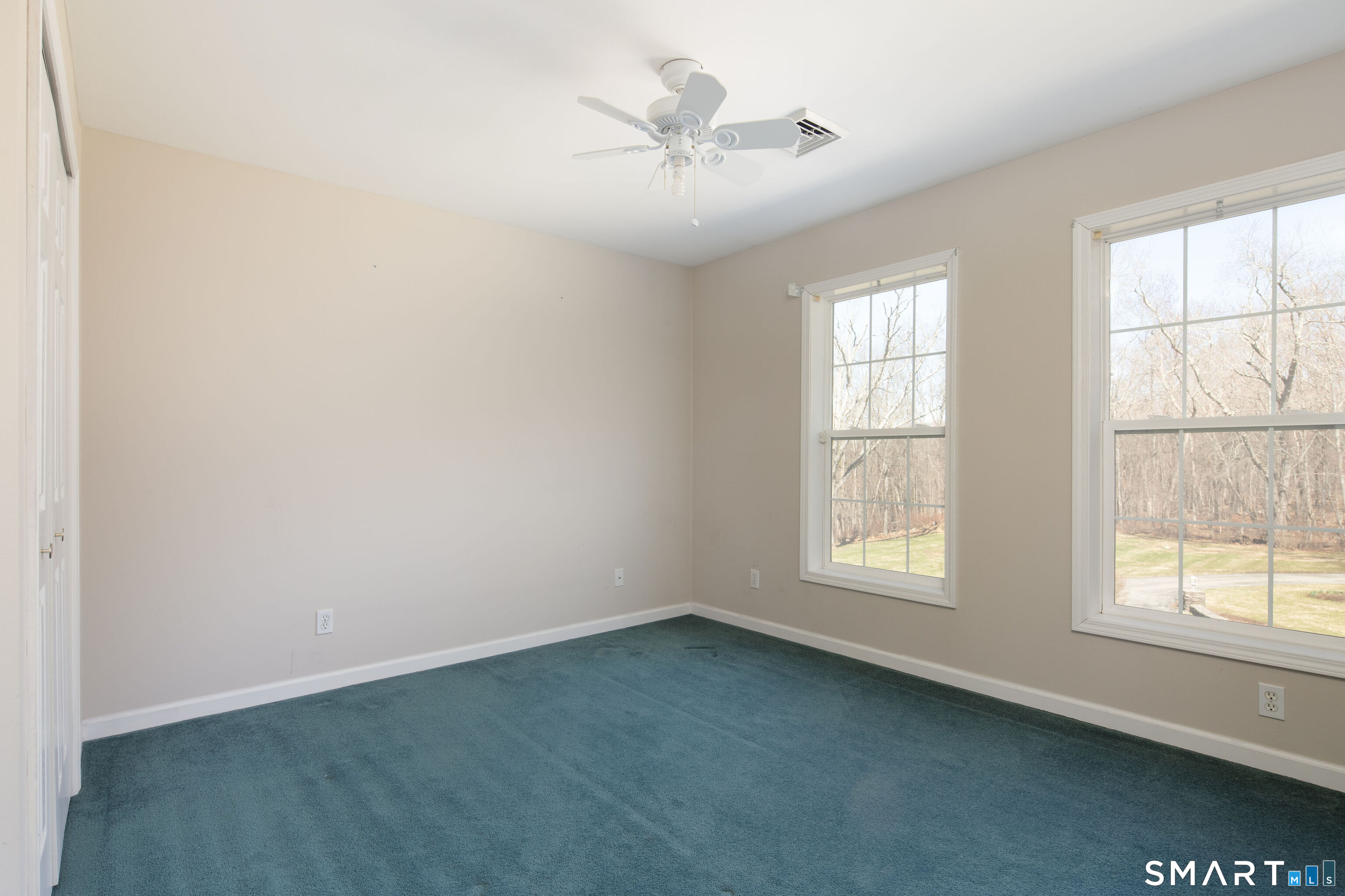 27 Smoke Ridge Drive Sherman, CT 06784 - Photo 31 of 40 The fourth bedroom is light and bright