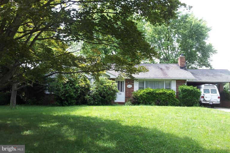 9911 Marilynn Road Perry Hall, MD 21128 - Photo 1 of 1 a front view of a house with a yard
