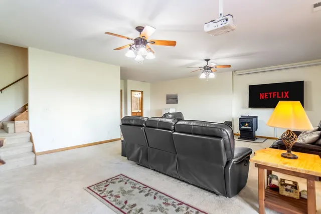 a view of a wooden deck with a garden
