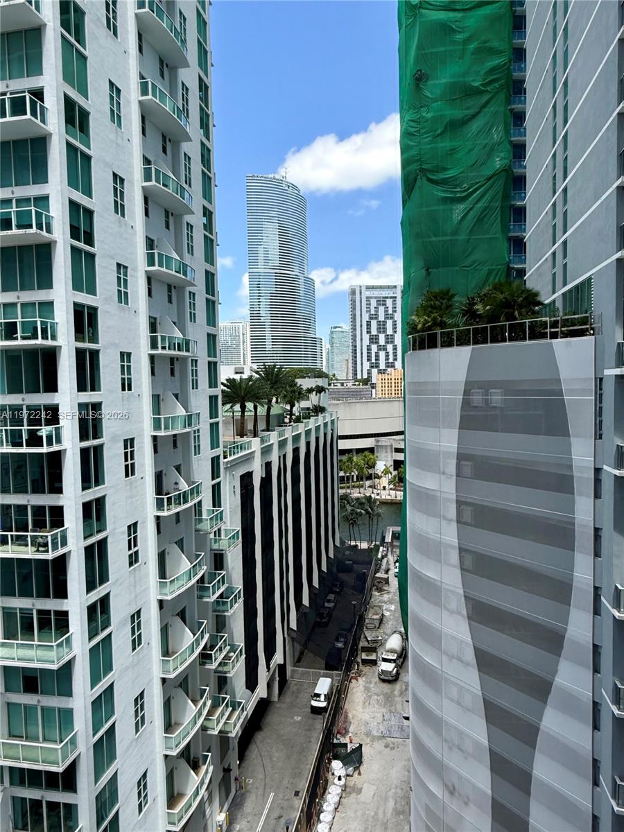 55 Southeast 6th Street, Unit 1201 Miami, FL 33131 - Photo 13 of 26 a city view with tall buildings