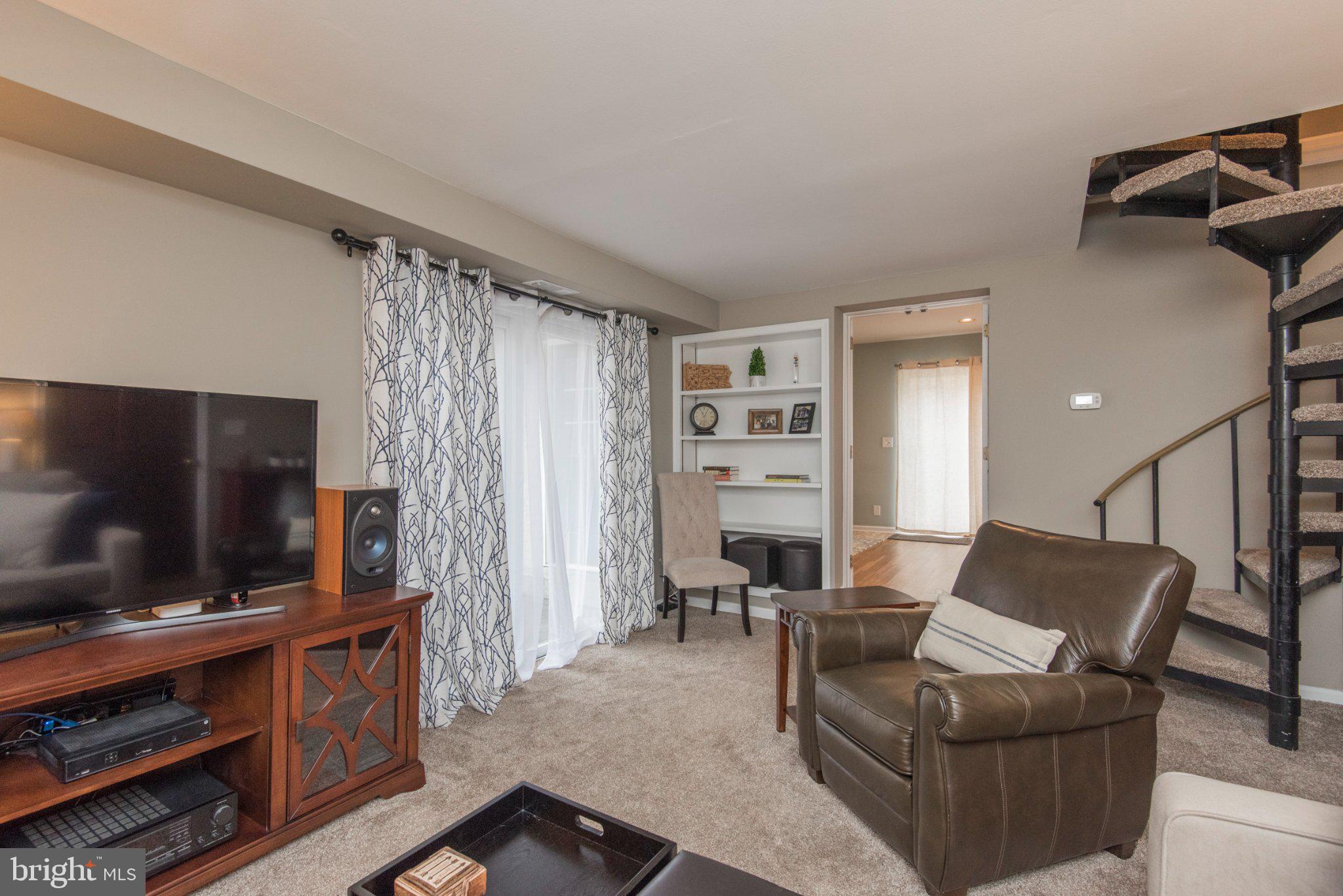 650 North Valley Forge Road Devon, PA 19333 - Photo 7 of 38 Cozy living space with spiral staircase.