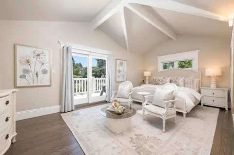 a view of balcony with furniture