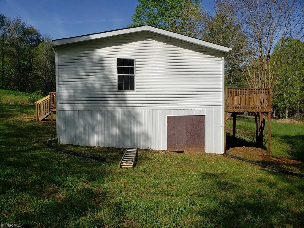 1578 Boone Gap Road Boomer, NC 28606 - Photo 3 of 30 Plenty of room for storage in the crawl space