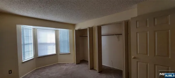 a view of an empty room with window
