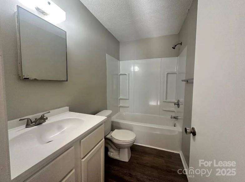 1428 Nottingham Road Kannapolis, NC 28081 - Photo 10 of 12 a bathroom with a sink toilet vanity and shower