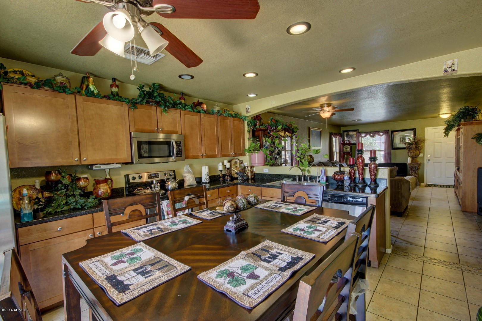 9614 West Payson Road Tolleson, AZ 85353 - Photo 3 of 21 Upgraded cabinets and fan